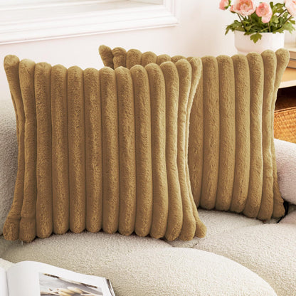 Verdelisse faux fur throw pillow covers in Camel, a pair on a boucle sofa