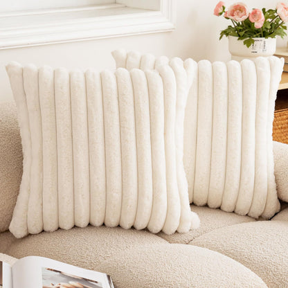 Verdelisse faux fur throw pillow covers in Cream White, a pair on a boucle sofa