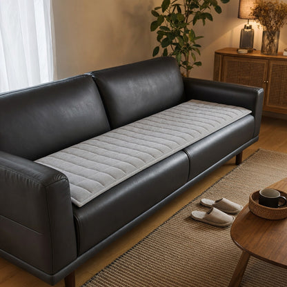 Light Grey corduroy sofa cushion cover on a dark leather sofa