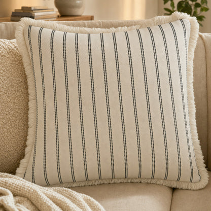 Verdelisse Striped Cushion Cover in Black, close-up of the woven pinstripes and fringe edge