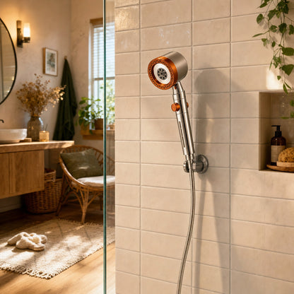 Verdelisse Pressure-Boosting Handheld Shower in Orange, in a warm, cozy bathroom