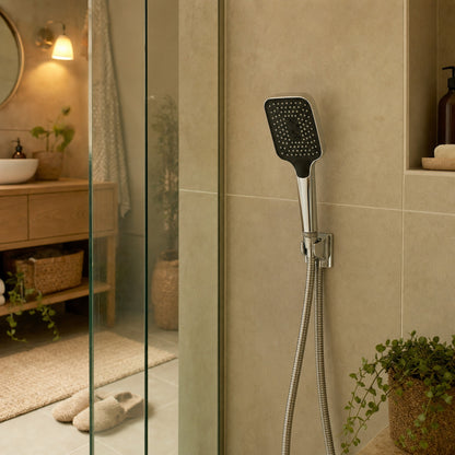 Verdelisse Boosted Shower Head in Silvery, in a warm, cozy bathroom
