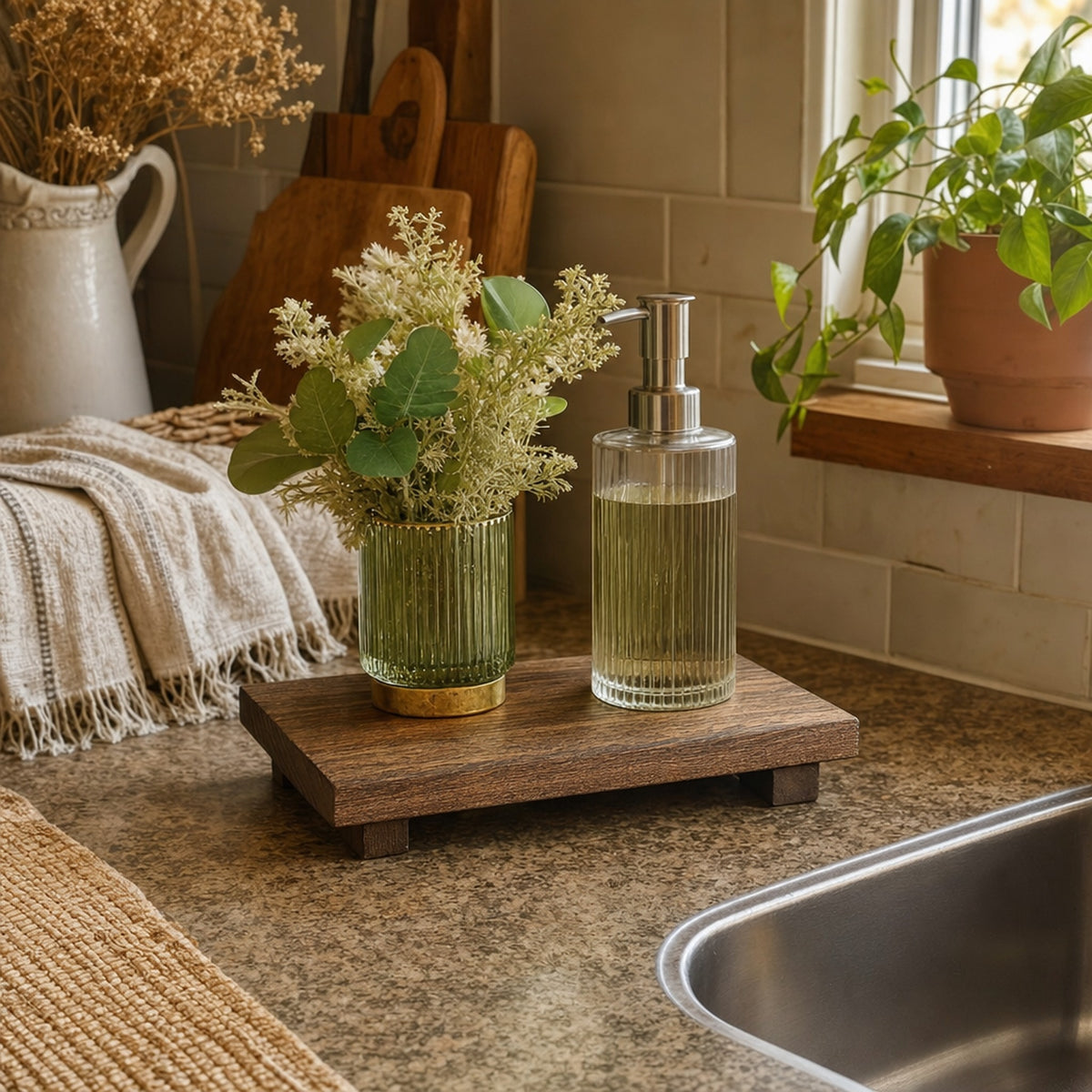 Verdelisse Wooden Bathroom Tray in Brown next to a kitchen sink with dish soap and flowers