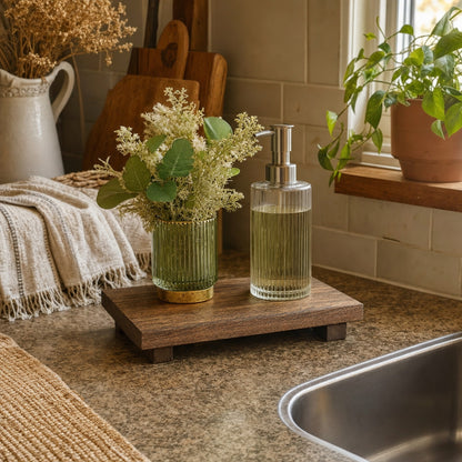 Verdelisse Wooden Bathroom Tray in Brown next to a kitchen sink with dish soap and flowers